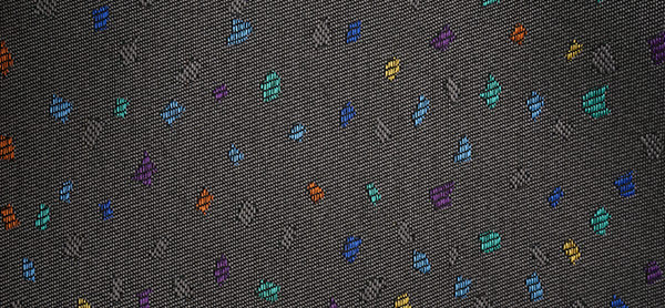 Grey rehab fabric laminated with colourful patterns